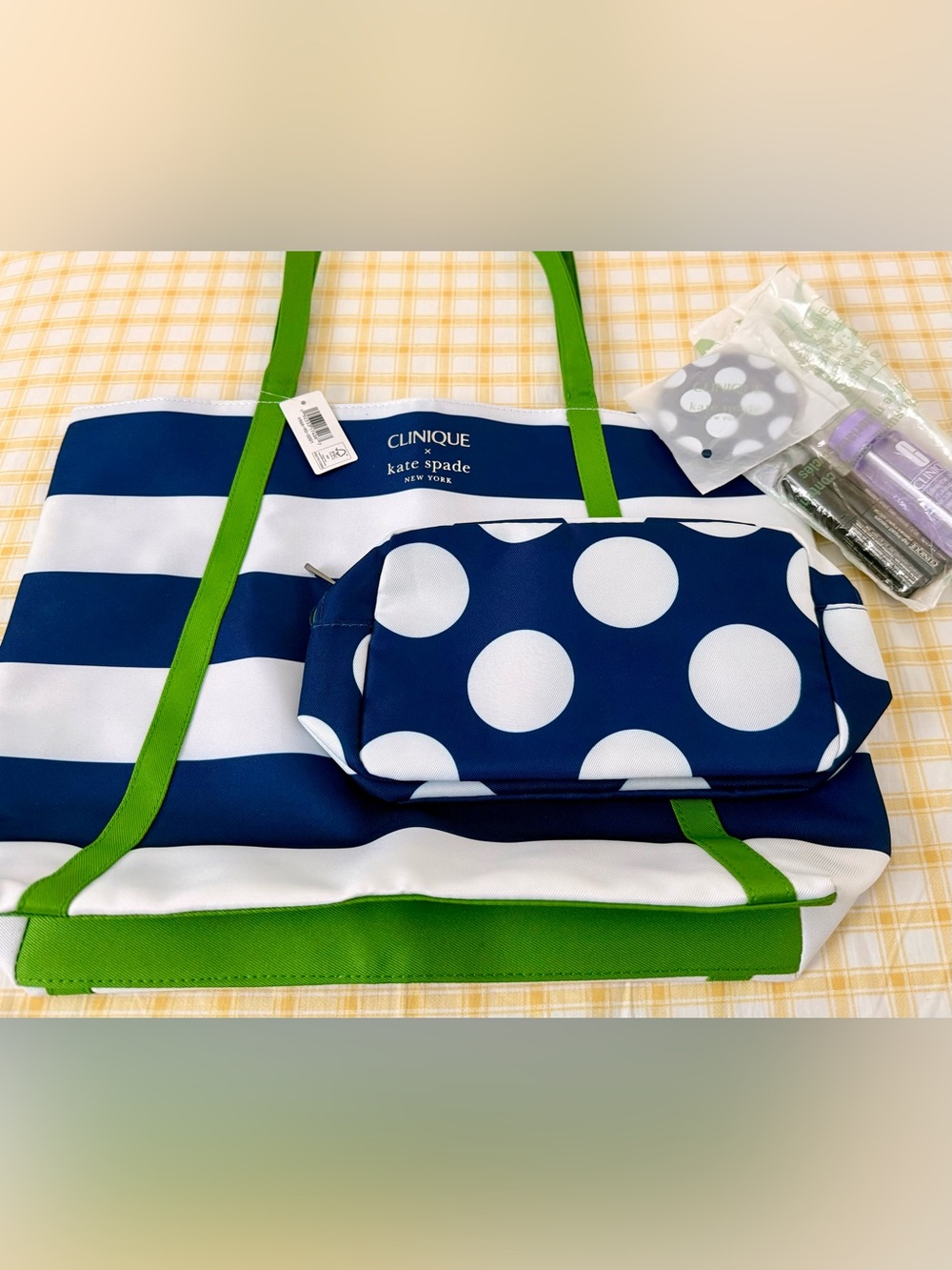 Clinique x Kate Spade 
Reversible water resistant tote and pouch
